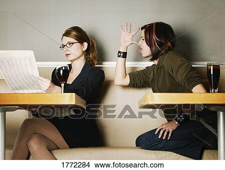 Picture - Teen making rude gesture. Fotosearch