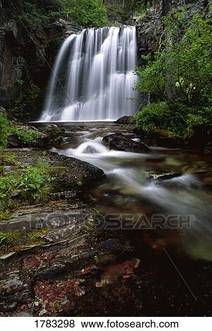 Stock Photo - Rockwell Falls, Glacier National Park. Fotosearch