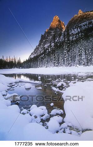 Snow covered river and mountainous landscape, Yoho National Park, B. C., Canada View Large Photo Image Stock Photography - Snow covered river and mountainous landscape, Yoho National Park, B. C., Canada. Fotosearch