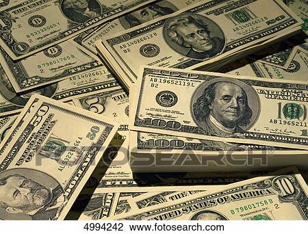 Stock Image - A plenty of american banknotes . Fotosearch