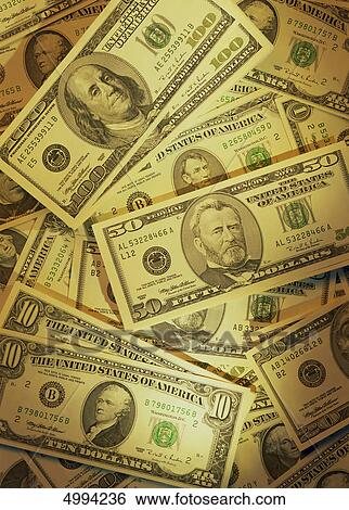 Stock Photograph - A plenty of american banknotes . Fotosearch