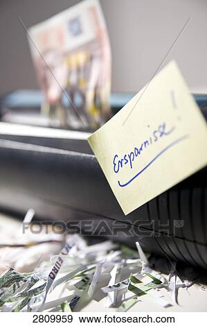 Adhesive note stuck on paper shredder View Large Photo Image Stock Photo - Adhesive note stuck on paper shredder . Fotosearch