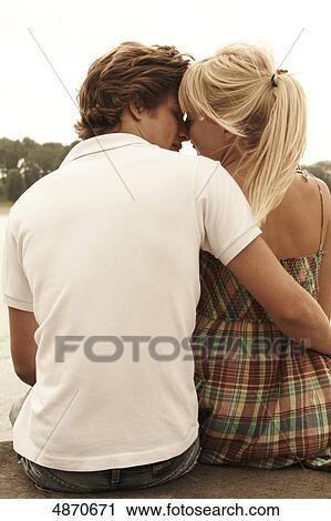 Affectionate young couple outdoors View Large Photo Image Stock Image - Affectionate young couple outdoors . Fotosearch