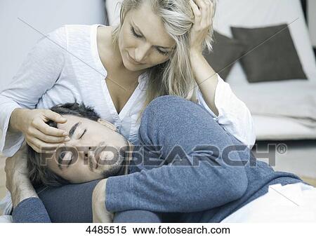 Stock Photography - Affectionate young couple . Fotosearch