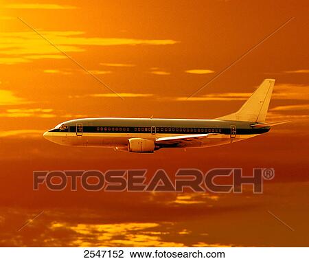 Stock Image - Airplane in flight . Fotosearch