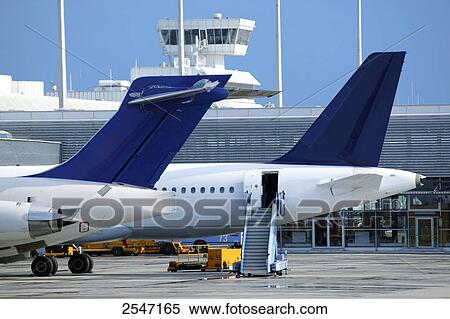Airplanes at airport View Large Photo Image Stock Photography - Airplanes at airport . Fotosearch