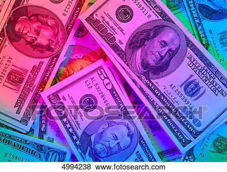 American banknotes in colored light View Large Photo Image Stock Photo - American banknotes in colored light . Fotosearch