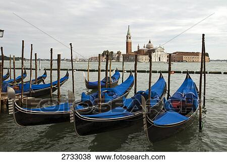 Boats moored on dock View Large Photo Image Stock Photo - Boats moored on dock . Fotosearch