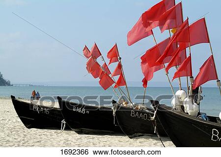 Stock Photograph - Boats on beach . Fotosearch