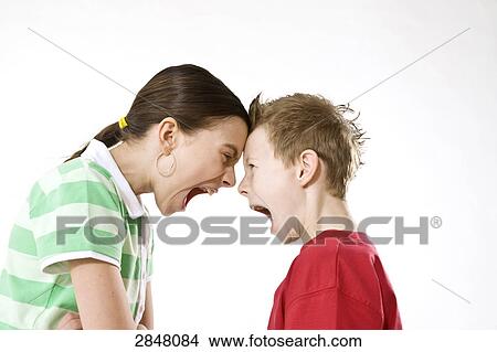 Boy and his sister shouting over each other View Large Photo Image Picture - Boy and his sister shouting over each other . Fotosearch
