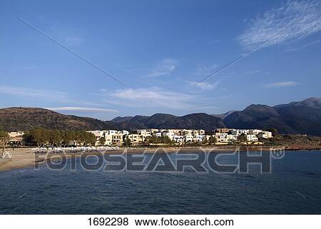 Buildings at beachfront View Large Photo Image Stock Photo - Buildings at beachfront . Fotosearch