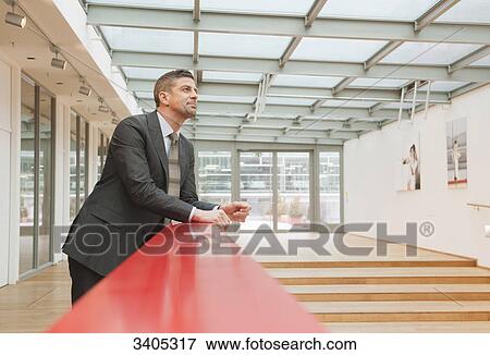 Business man looking at camera View Large Photo Image Stock Photo - Business man looking at camera . Fotosearch