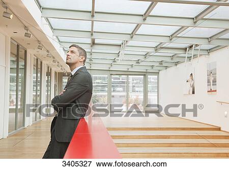 Business man looking at camera View Large Photo Image Stock Photo - Business man looking at camera . Fotosearch