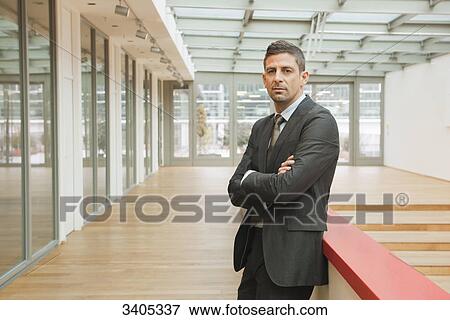 Business man looking at camera View Large Photo Image Stock Photo - Business man looking at camera . Fotosearch