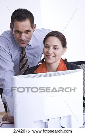 Stock Photography - Business people discussing in office . Fotosearch