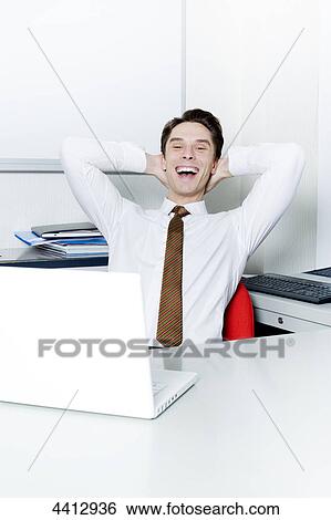 Stock Photograph - Businessman laughing . Fotosearch