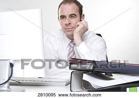 Businessman using laptop View Large Photo Image Stock Photography - Businessman using laptop . Fotosearch