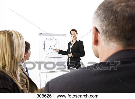 Businesswoman giving a presentation View Large Photo Image Stock Image - Businesswoman giving a presentation . Fotosearch