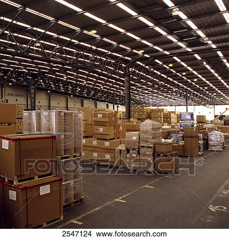Cardboard boxes in warehouse View Large Photo Image Picture - Cardboard boxes in warehouse . Fotosearch