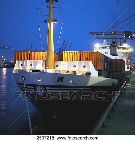 Stock Photo - Cargo containers on ship at harbor . Fotosearch