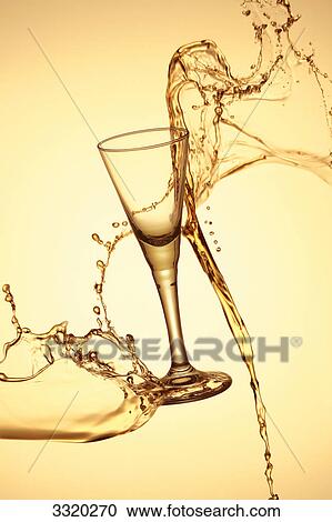 Stock Image - Champagne glass in the air . Fotosearch