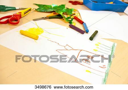 Stock Photograph - Childs drawing on a table . Fotosearch