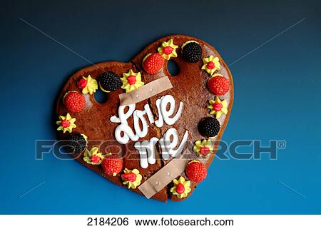 Stock Photograph - Close-up of bandaged valentine cake . Fotosearch