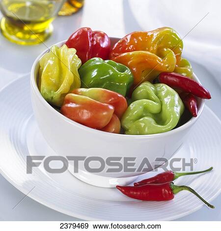 Stock Photo - Close-up of bowl of bell peppers on plate . Fotosearch