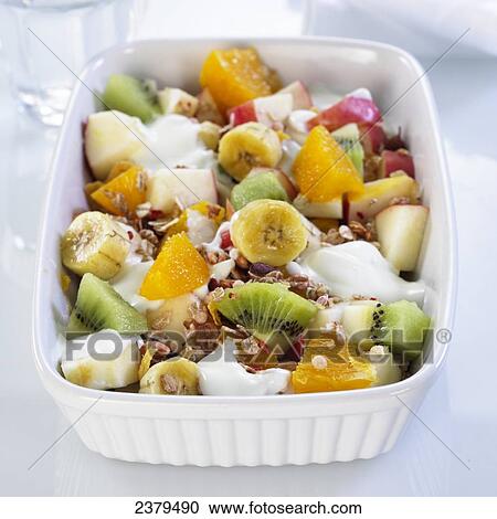 Stock Image - Close-up of bowl of fruit salad . Fotosearch