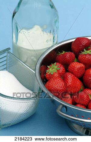 Close-up of bowls of strawberries and sugar View Large Photo Image Stock Image - Close-up of bowls of strawberries and sugar . Fotosearch