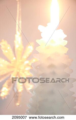 Close-up of burning candle View Large Photo Image Stock Photo - Close-up of burning candle . Fotosearch