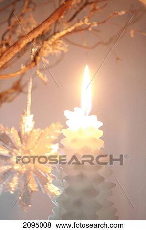 Close-up of burning candle View Large Photo Image Stock Photo - Close-up of burning candle . Fotosearch