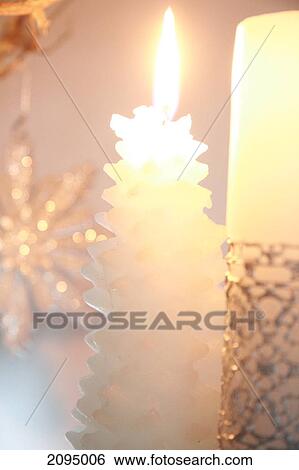 Close-up of burning candle View Large Photo Image Stock Photograph - Close-up of burning candle . Fotosearch