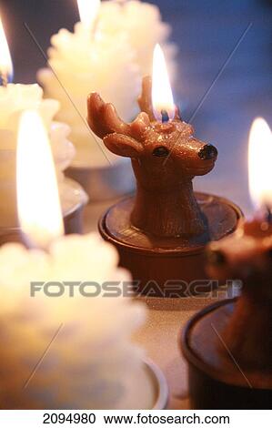 Close-up of burning Christmas candle View Large Photo Image Stock Image - Close-up of burning Christmas candle . Fotosearch