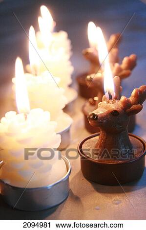 Close-up of burning Christmas candle View Large Photo Image Stock Image - Close-up of burning Christmas candle . Fotosearch