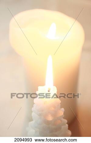 Close-up of burning Christmas candles View Large Photo Image Stock Image - Close-up of burning Christmas candles . Fotosearch