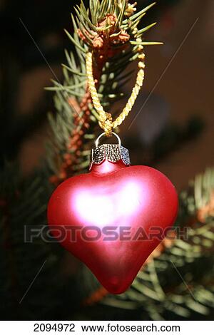 Close-up of Christmas ornament hanging on tree View Large Photo Image Stock Image - Close-up of Christmas ornament hanging on tree . Fotosearch