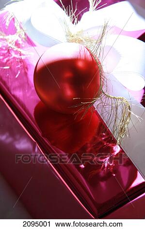 Close-up of Christmas ornament with gift box View Large Photo Image Stock Image - Close-up of Christmas ornament with gift box . Fotosearch