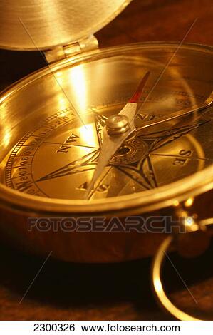 Close-up of compass View Large Photo Image Stock Photograph - Close-up of compass . Fotosearch