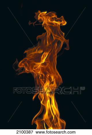 Stock Photo - Close-up of flame against black background . Fotosearch