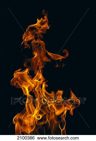 Close-up of flame against black background View Large Photo Image Stock Photograph - Close-up of flame against black background . Fotosearch