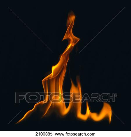 Close-up of flame against black background View Large Photo Image Stock Photography - Close-up of flame against black background . Fotosearch