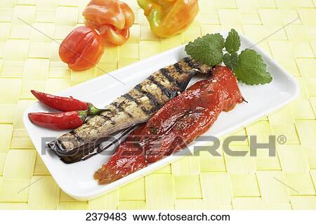 Close-up of fried seafood with red chili peppers and mint leaves in platter View Large Photo Image Stock Image - Close-up of fried seafood with red chili peppers and mint leaves in platter . Fotosearch