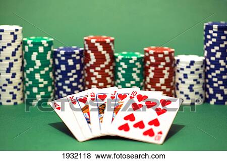 Stock Photo - Close-up of gambling chips with cards . Fotosearch