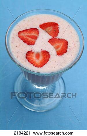 Close-up of glass of strawberry shake View Large Photo Image Stock Image - Close-up of glass of strawberry shake . Fotosearch