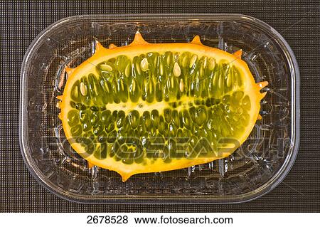 Close-up of halved kiwano in case View Large Photo Image Stock Photo - Close-up of halved kiwano in case . Fotosearch
