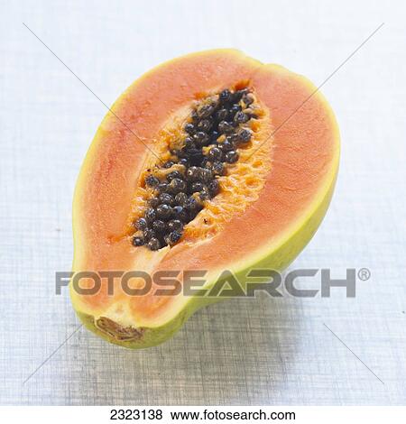 Close-up of halved papaya View Large Photo Image Stock Photo - Close-up of halved papaya . Fotosearch