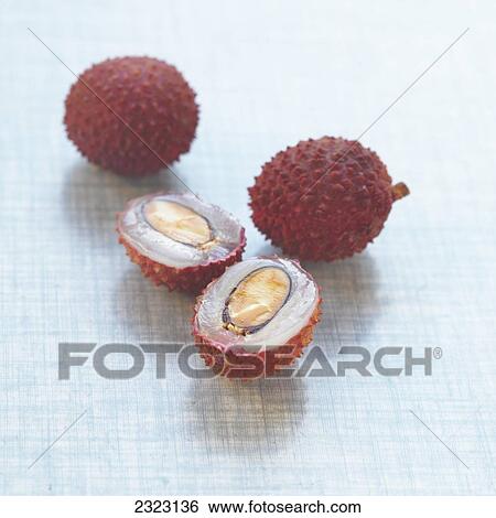 Stock Photograph - Close-up of lychee on table . Fotosearch