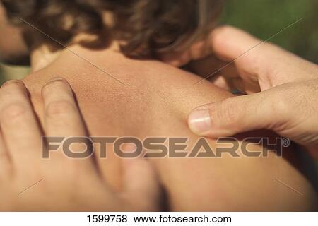 Close-up of person receiving back massage View Large Photo Image Stock Photo - Close-up of person receiving back massage . Fotosearch