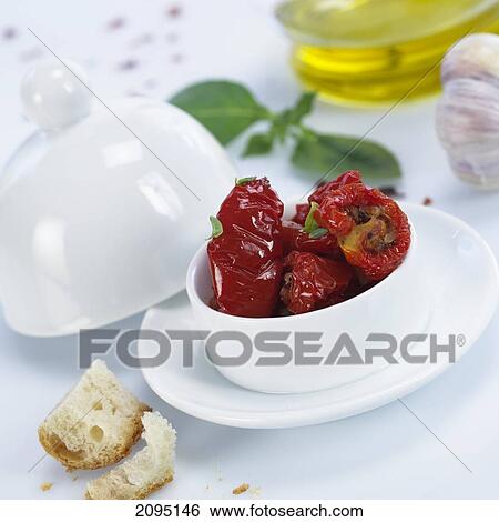 Stock Photograph - Close-up of red chili peppers in bowl . Fotosearch